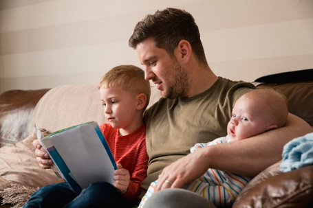 Person with children reading